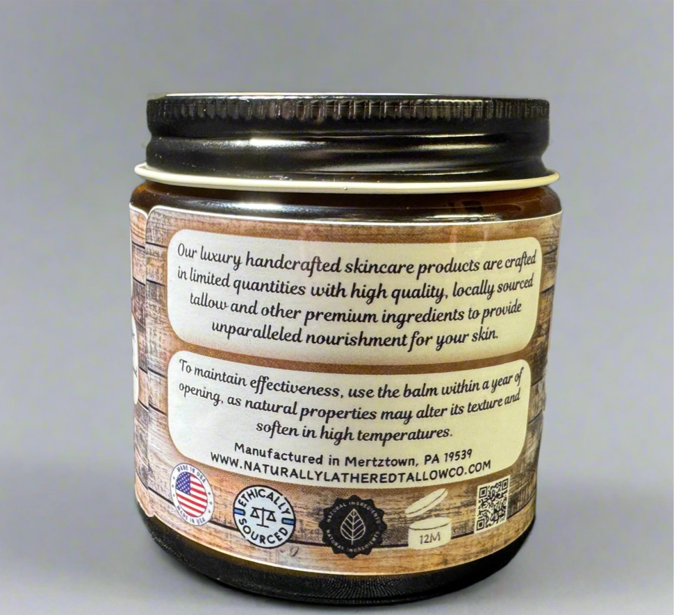 Skincare balm jar with label on a gray background