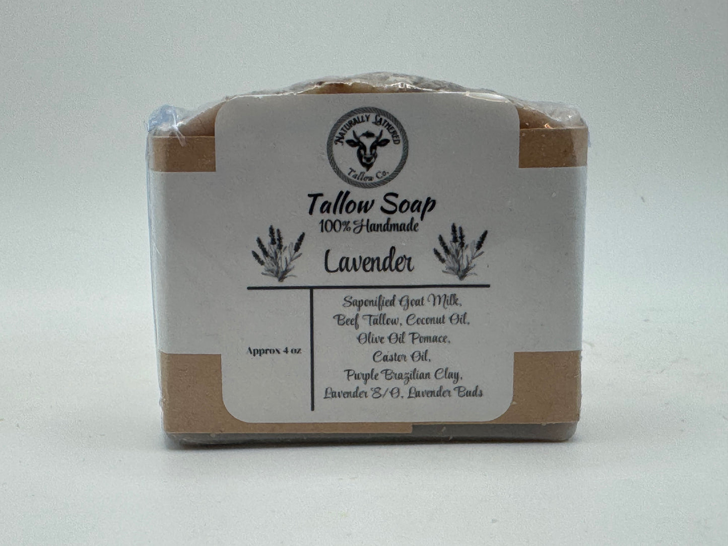 Bar of lavender soap with a label on a light gray background