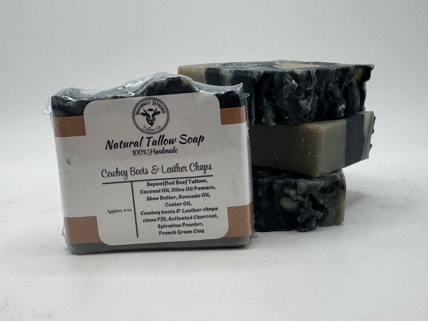 Stack of natural tallow soap bars with a label on a white background