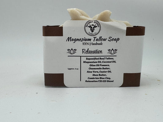 Bar of magnesium tallow soap with a label on a white background