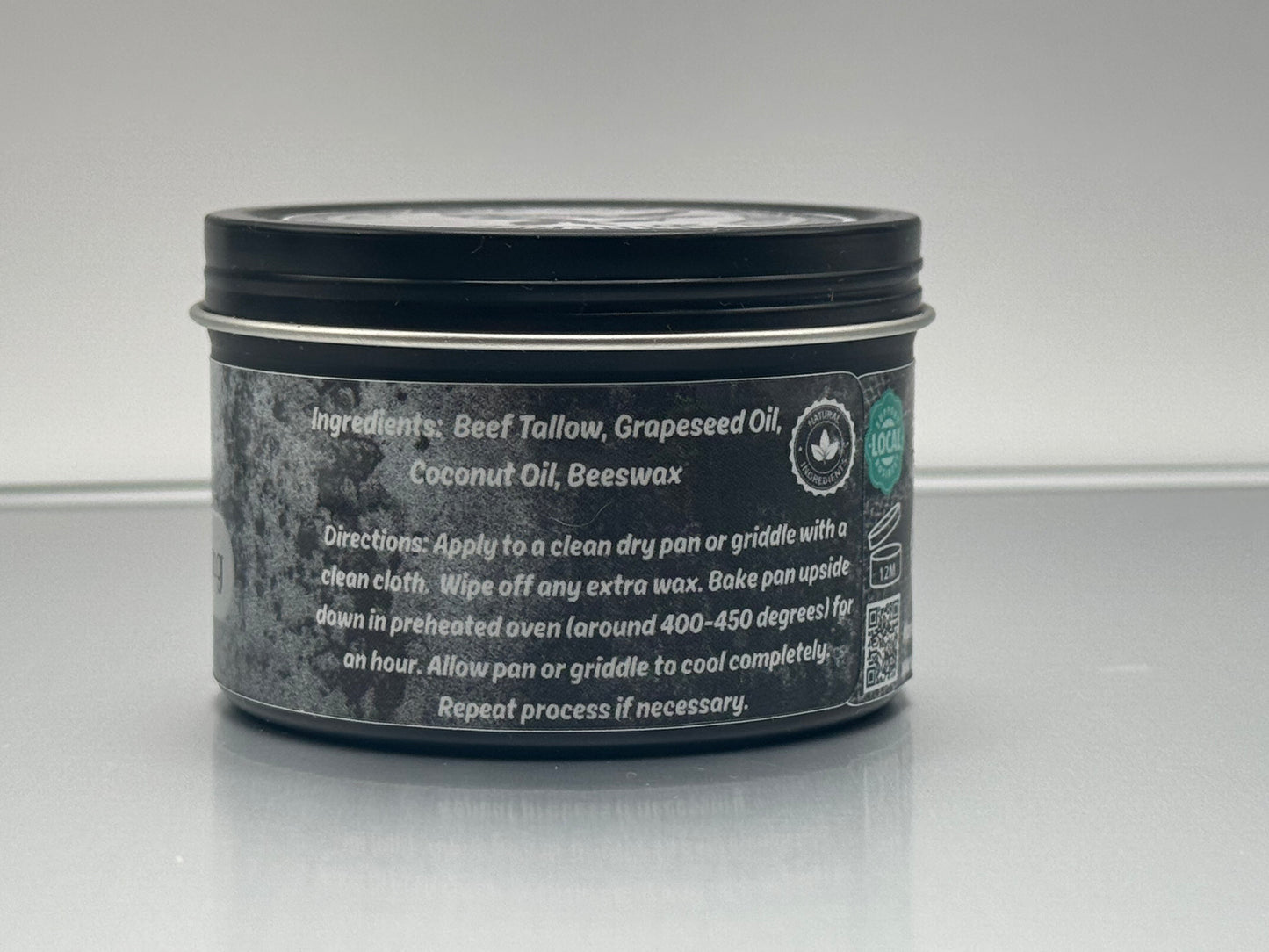 Container with a label on a gray background