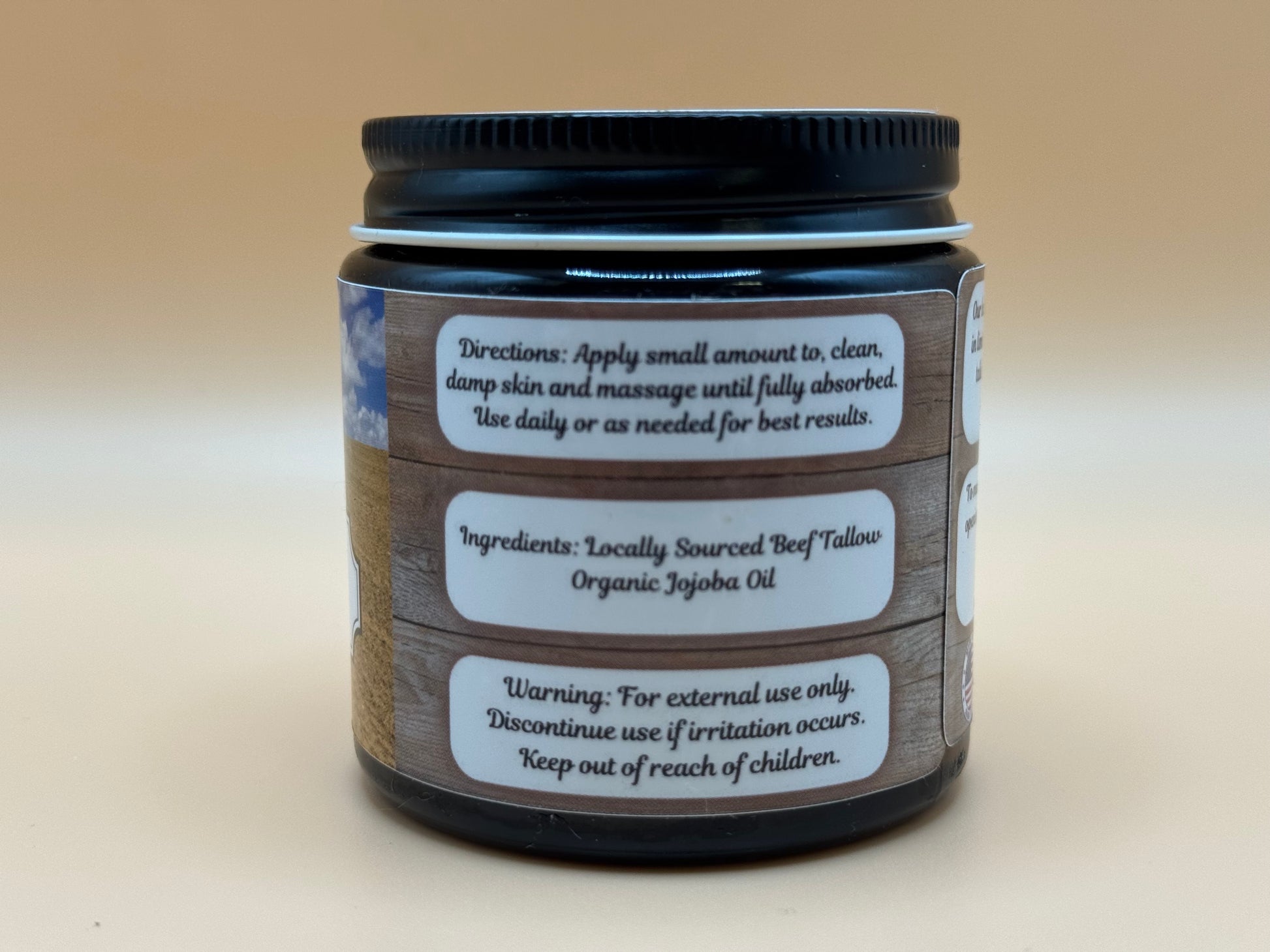 Jar with labels on a beige background