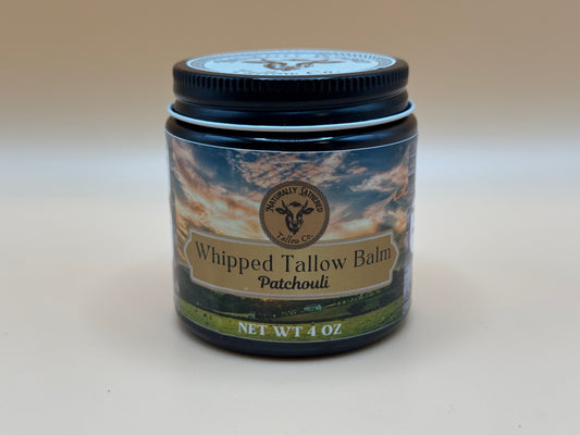 Jar of Whipped Tallow Balm with a scenic label on a white background