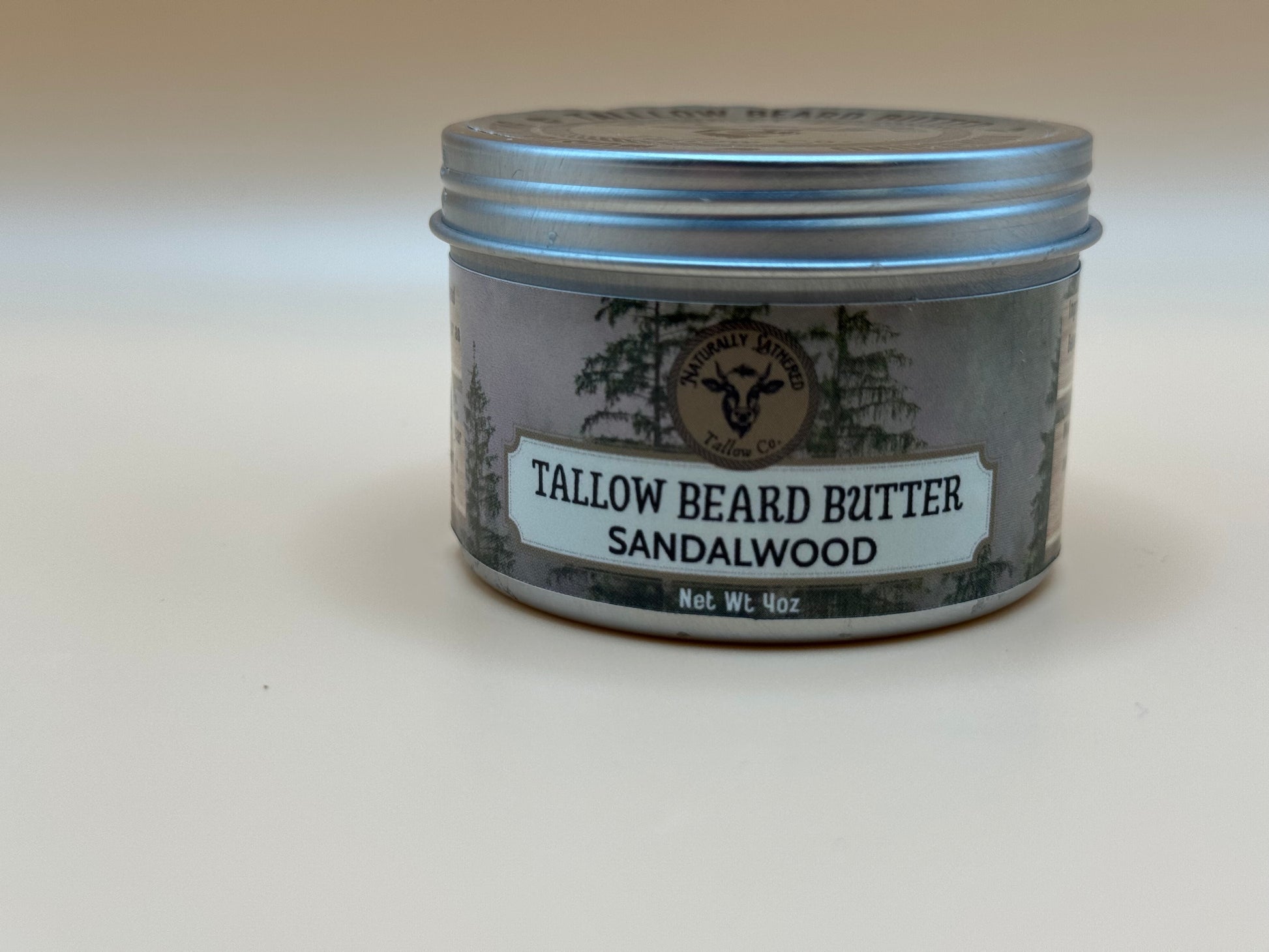 Tallow beard butter container with sandalwood scent on a white background