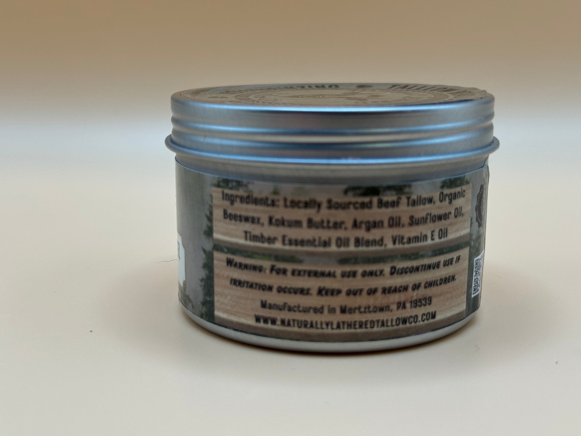 Jar with a label on a beige background