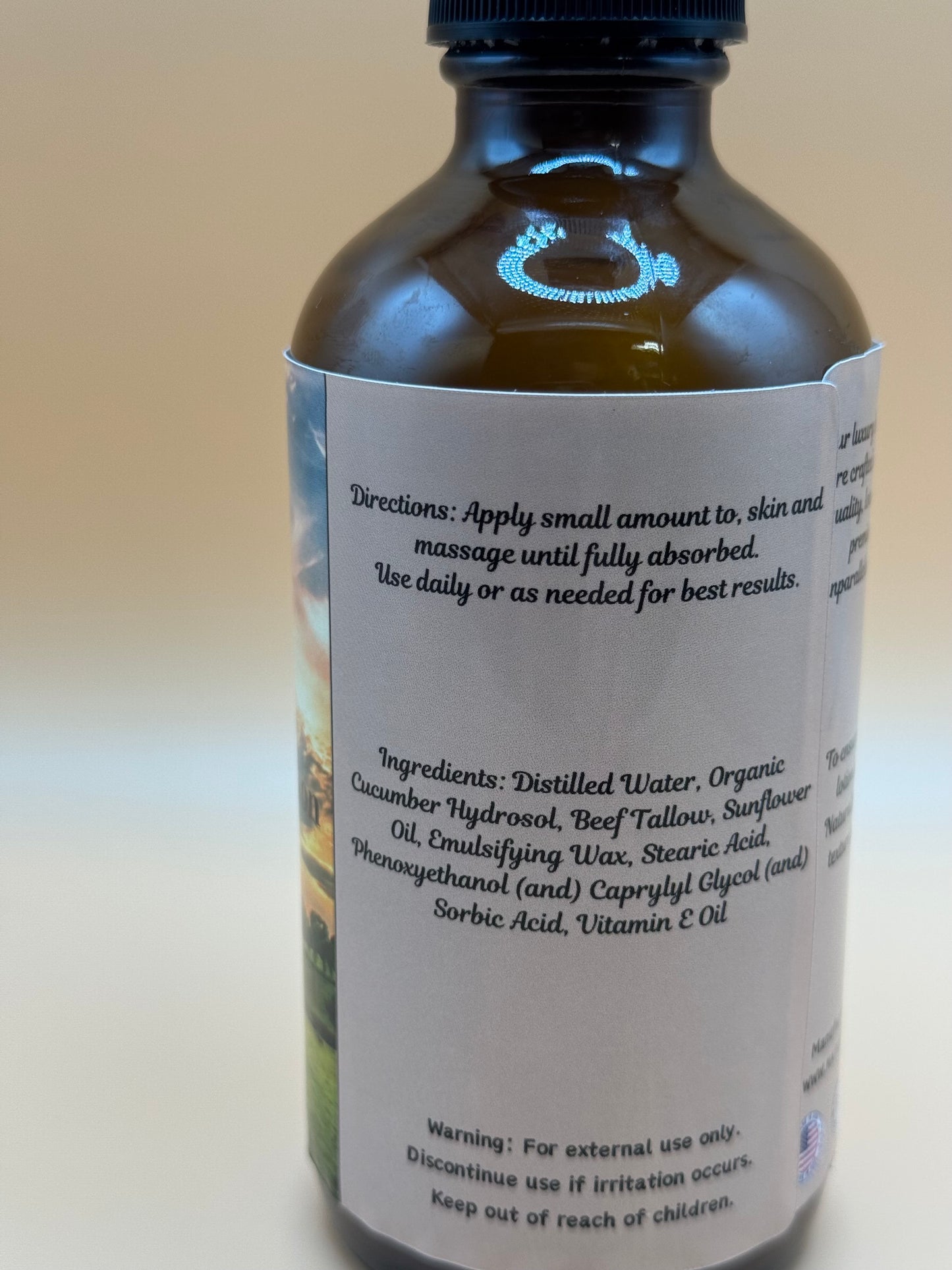 Bottle with a label on a beige background